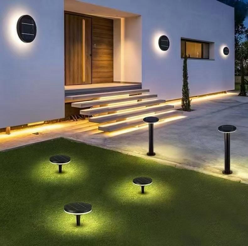 Garden bollards and step lighting at dusk